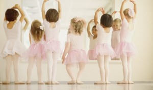 Ballet Dancers Performing in Front of Mirror