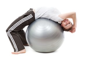 exercising_on_a_gym_ball_198632_resize